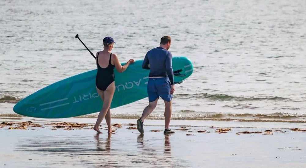 Riding the Waves to Wellness: The Surprising Health Benefits of Paddle Boarding